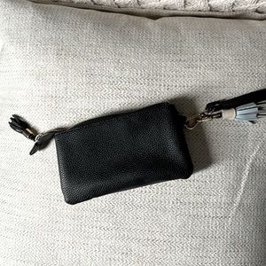 Indigo brand wristlet with spacious 3 compartments